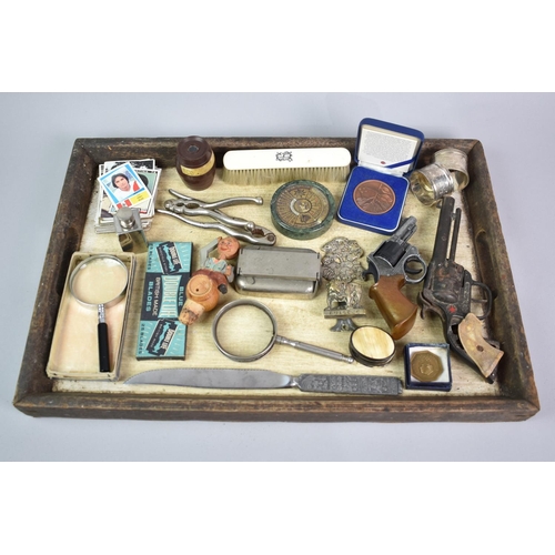 246 - A Collection of Various Sundries top include Toy Pistols, 40 Year Calendar, Magnifying Glasses, Napk... 