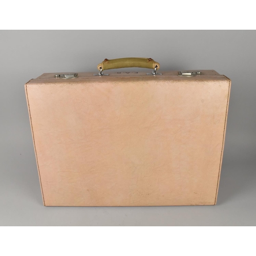 253 - A Vintage Fitted Pink Leather Travelling Suitcase with pull Down Front Monogrammed EAR, 51cms Wide