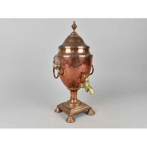 26 - A 19th Century Copper and Brass Adam Style Vase Shaped Samovar with Lion Mask Ring Handles, Missing ... 