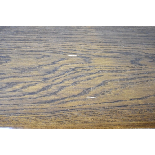 31 - A Mid 20th Century Oak Lowboy Table on Chamfered Rectangular Supports having Centre Drawer Flanked b... 