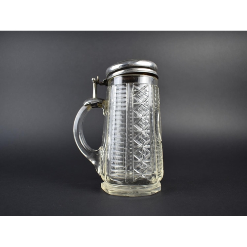 440 - A Continental Silver and Cut Glass Stein, the Hinged Lid with Chased Foliate Decoration, 17.5cm high