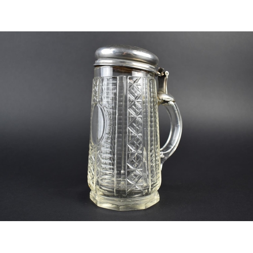 440 - A Continental Silver and Cut Glass Stein, the Hinged Lid with Chased Foliate Decoration, 17.5cm high