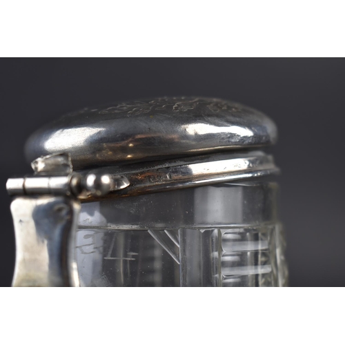 440 - A Continental Silver and Cut Glass Stein, the Hinged Lid with Chased Foliate Decoration, 17.5cm high