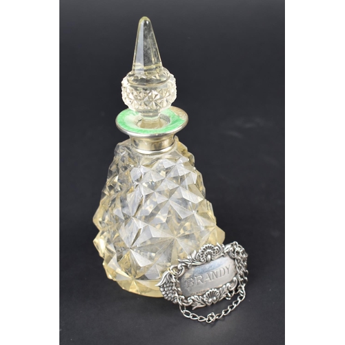 444 - A Silver and Enamel Mounted Cut Glass Scent Bottle and Stopper, 16cm high Together with a Silver Dec... 