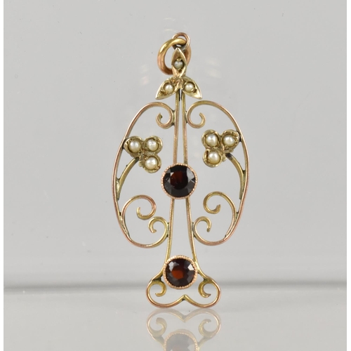 500 - An Early 20th Century 9ct Gold, Seed Pearl and Garnet Pendant, Primary Round Cut Garnet Measuring 4.... 