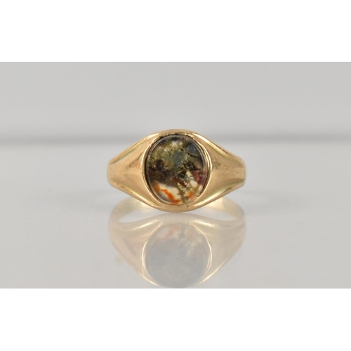 501 - A 19th Century Moss Agate Mounted Signet Ring, Central Oval Stone Measuring 8.3mm by 6.9mm on a Wide... 