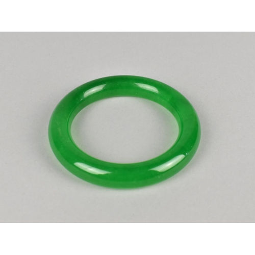 503 - A Contemporary Simulated Jade Green Stone Bangle, Interior Dimensions 61mm