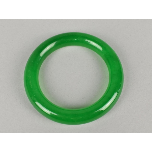 503 - A Contemporary Simulated Jade Green Stone Bangle, Interior Dimensions 61mm