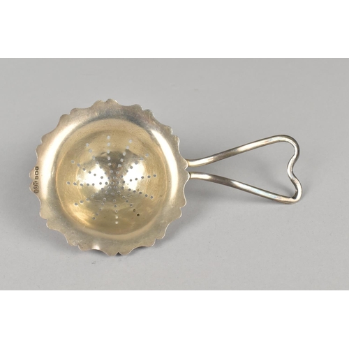 572 - A Silver Tea Strainer by E J Houlston Ltd, 31g