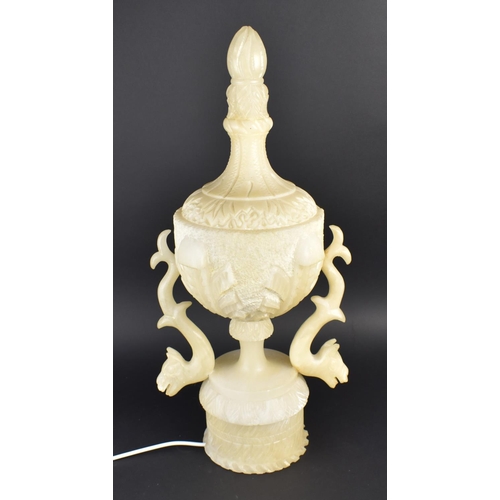 573 - A Carved Stone Table Lamp Base of Urn Form with Zoomorphic Handles, 64cm high