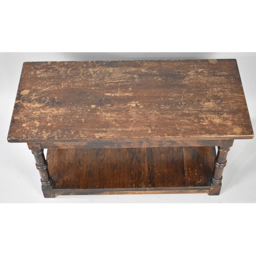 576 - A Mid 20th Century Oak Rectangular Coffee Table with Stretcher Shelf, Water stained Top, 80cms by 38... 