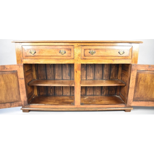 577 - A Modern oak Sideboard with Two Drawers over Cupboard, 137cms Wide