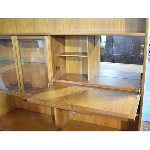 579 - A 1970s Teak Lounge Unit, Probably Nathan, Base Section with Three Drawers Over Cupboards, Raised Gl... 