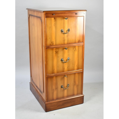 588 - A Late 20th Century Yew Wood Three Drawer Filing Cabinet with Brushing Slide Over, 50cms Wide and 11... 