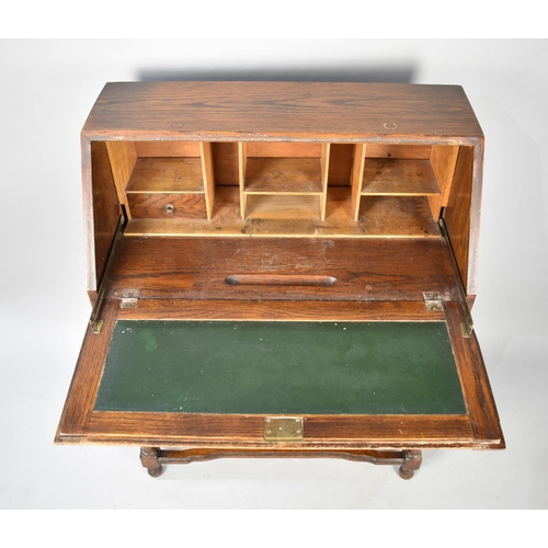 589 - A Mid 20th Century oak Fall Front Bureau with Two Drawers, One Handle Missing, 76cms Wide