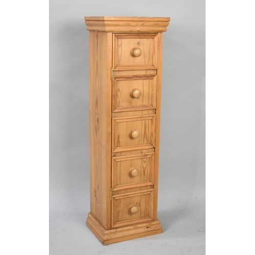 592 - A Modern Narrow Pine Five Division Storage Cabinet in the Form of a Five Drawer Chest, 28cms Wide