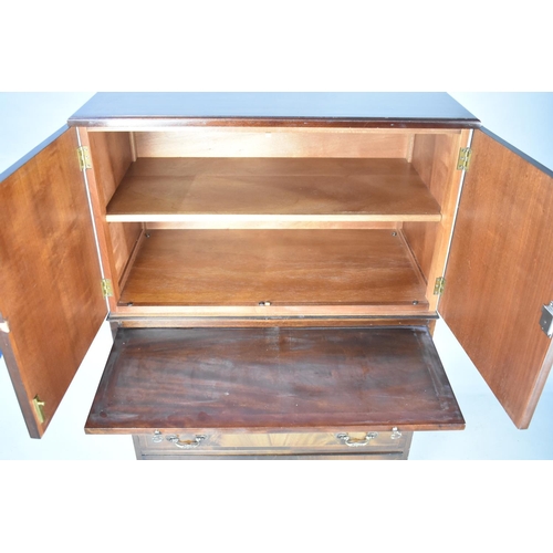 602 - A Mahogany Side Cabinet with Panelled Doors to Shelved Top Section, Brushing Slide Over Four Long Dr... 