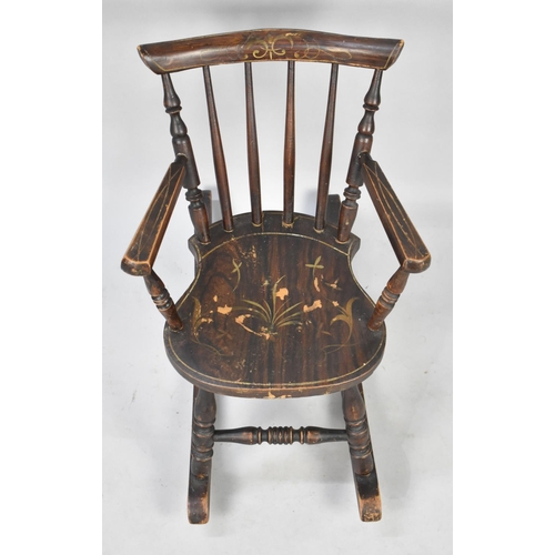 607 - A Mid 20th Century Childs Rocking Chair with Painted Decoration