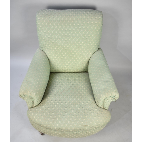 609 - A Reupholstered 19th Century Long Arm Armchair with Castors