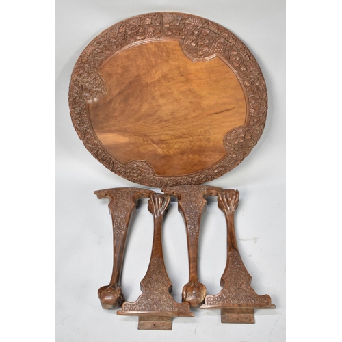 611 - An Intricately Carved Colonial Hardwood Circular Topped Coffee Table with Claw and Ball Feet, 60cms ... 