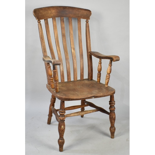 622 - A Late 19th Century Kitchen Armchair with Elm Seat and High Splat Back