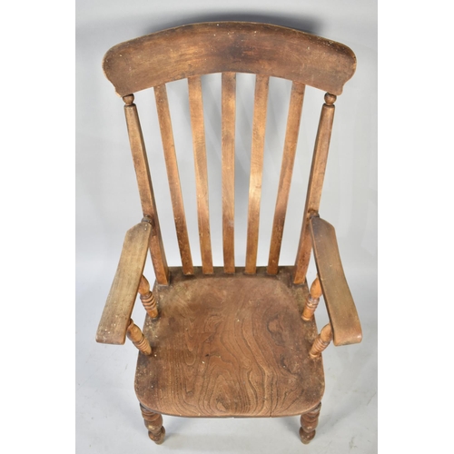 622 - A Late 19th Century Kitchen Armchair with Elm Seat and High Splat Back