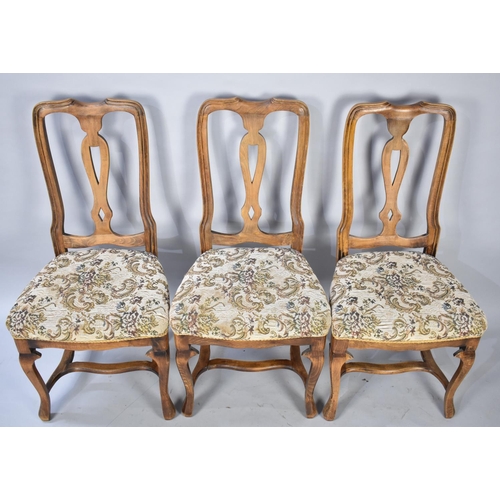 630 - A Set of Six Tapestry Seated Dining Chairs