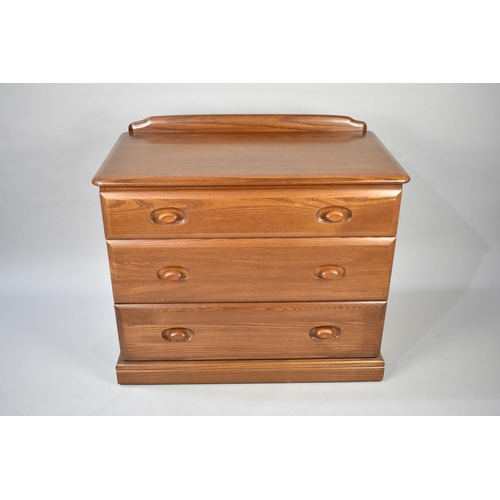 635 - A Mid Century Teak Chest of Three Long Drawers with Galleried Back, Having Label for Cousins & Matth... 