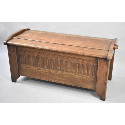 638 - An Mid 20th Century Oak Coffer Chest with Hinged Lid and Carved Front, 106cm wide