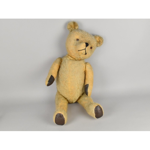 64 - A Vintage Straw Filled Large Teddy Bear, Glass Eyes, 66cms High