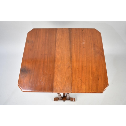 76 - A Late Victorian/Edwardian Mahogany Drop Leaf Sutherland Table with Turned Supports, 59cms Wide