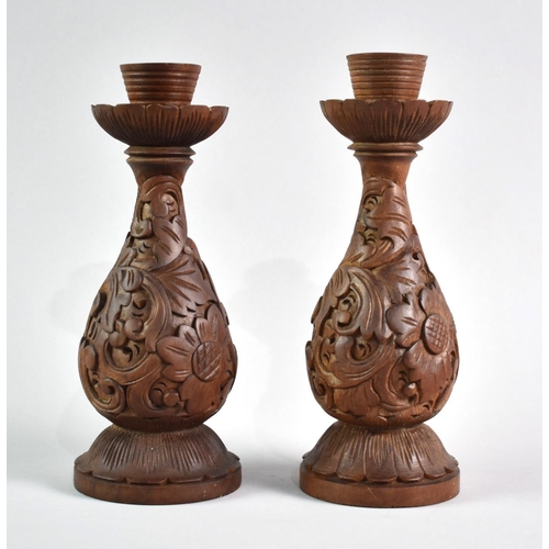 79 - A Pair of Norwegian Carved Wooden Candlesticks, 20cms High