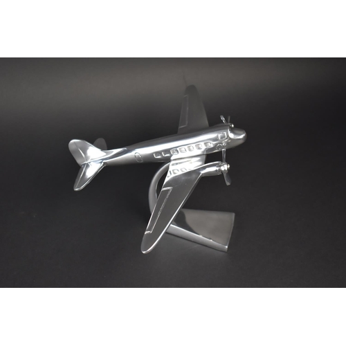 80 - A Modern Chromed Desktop Model of a Twin Engine Airliner, 30cms Wingspan