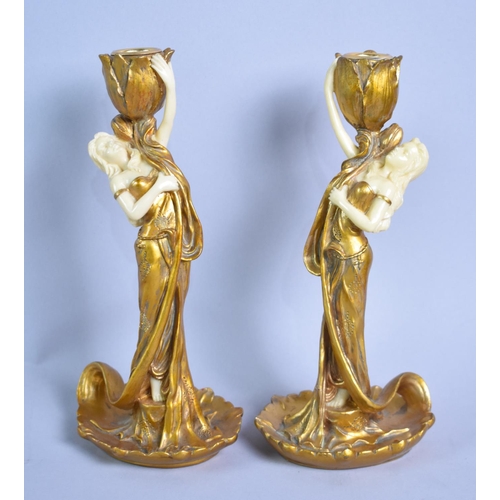 81 - A Pair of Gilt Resin Figural Candlesticks, 21cms High