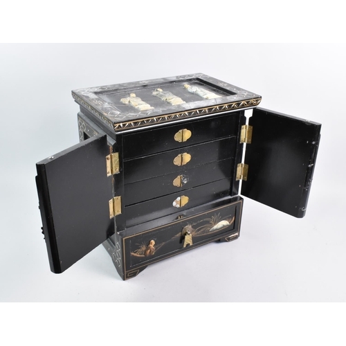 28 - A Chinese Black Lacquered Table Top Jewellery Cabinet with Hinged Doors to Four Fitted Drawers Surmo... 