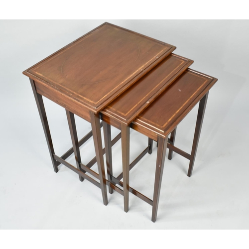 41 - An Edwardian Mahogany Crossbanded and Sting Inlaid Nest of Three Tables, Largest 46x33.5x57cms High