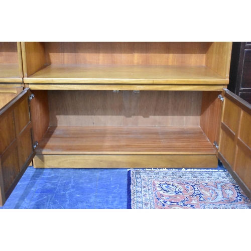 465 - A Nathan Unit with Glazed Cabinet To Open Top Section and Two Panel Cupboard to Base, 102cms Wide