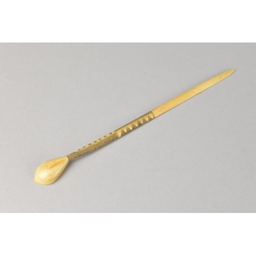 12 - An Early Carved Bone Long Handled Spoon with Geometric Decoration, 18cms Long