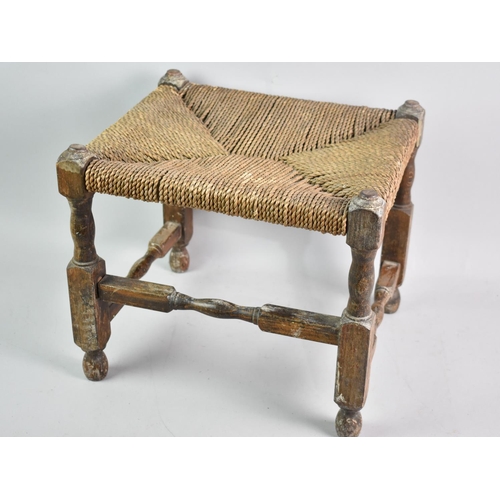 211 - A Vintage Oak Framed Rush Seated Stool in Need of Repair and Restoration, 35cms Wide