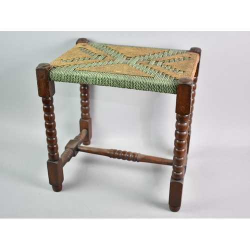 219 - A Vintage Bobbin Legged Rush Topped Rectangular Stool, Oak Frame 40cms Wide