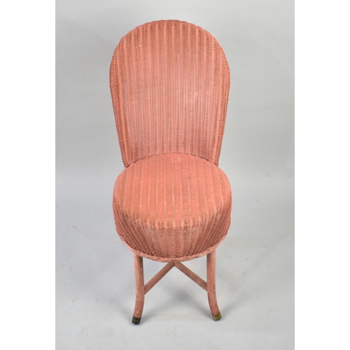 461 - A Circular Seated Pink Lloyd Loom Bedroom Chair