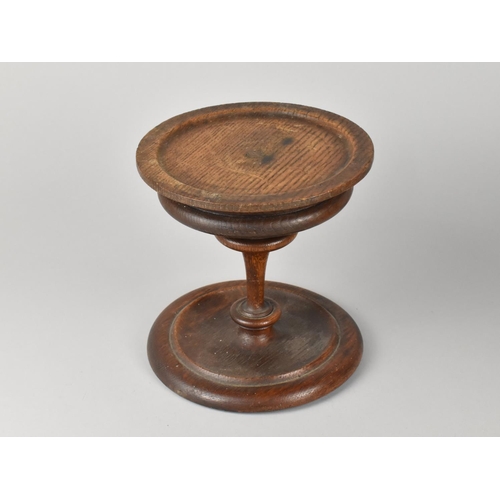 6 - A Circular Carved Oak Stand with Turned Support, 18cms Diameter and 18cms High