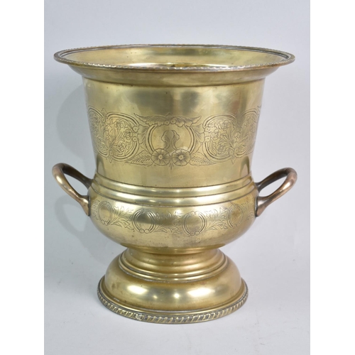 63 - A Mid 20th Century Brass Two Handled Wine Cooler with Engraved Decoration, 23cms Diameter and 25cms ... 