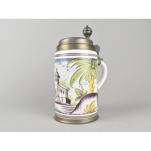 190 - A Tin Glazed Polychrome Decorated and Pewter Mounted Tankard, 24cms High