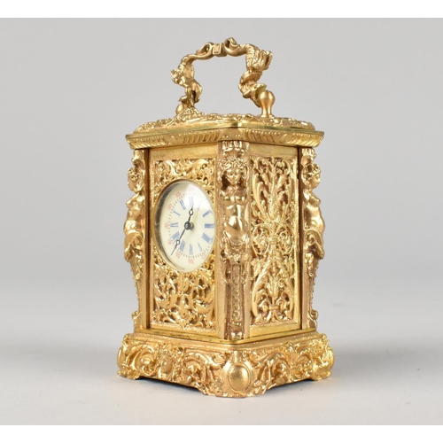 21 - A Reproduction French Style Gilt Metal Miniature Carriage Timepiece with Ornate Decoration, with Key... 