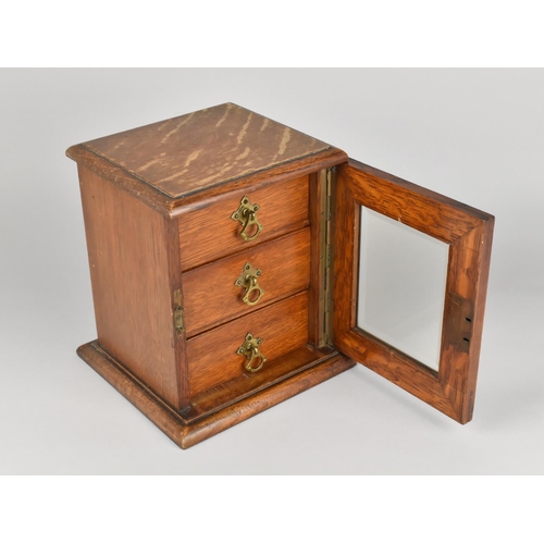 55 - An Early 20th Century Oak Table Top Collectors Chest with Front Glass Inset Hinged Door to Three Dra... 