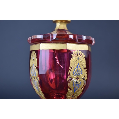 56 - A 19th Century Bohemian Cranberry Glass Goblet and Cover having Scrolled Motif Decoration in Applied... 