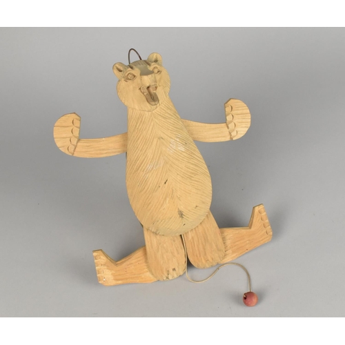 67 - A Mid 20th Century Carved Wooden Mechanical Pull String Bear, 28cms Long