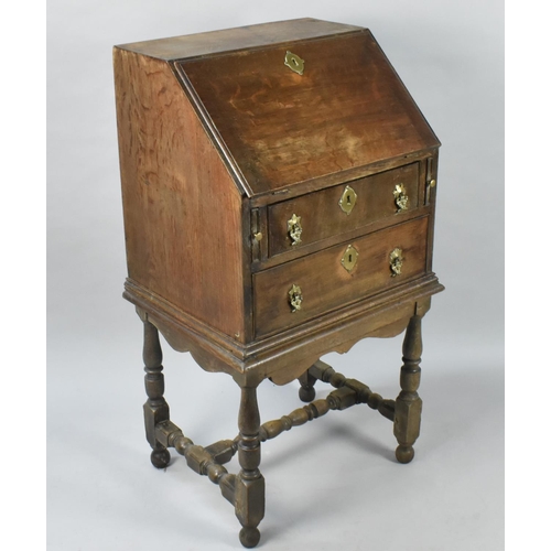 69 - A 19th Century Oak Bureau of Small Proportions Having Hinged Front to Fitted Interior Surmounting Tw... 