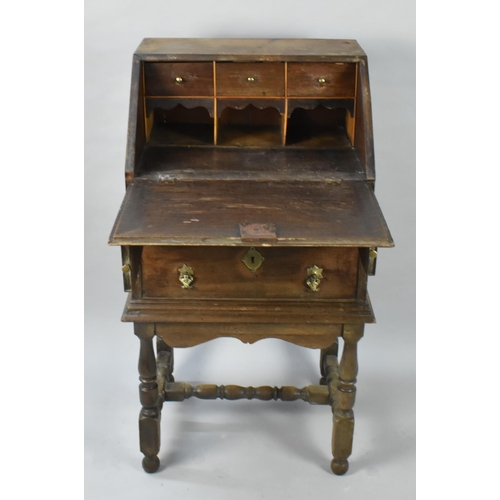 69 - A 19th Century Oak Bureau of Small Proportions Having Hinged Front to Fitted Interior Surmounting Tw... 